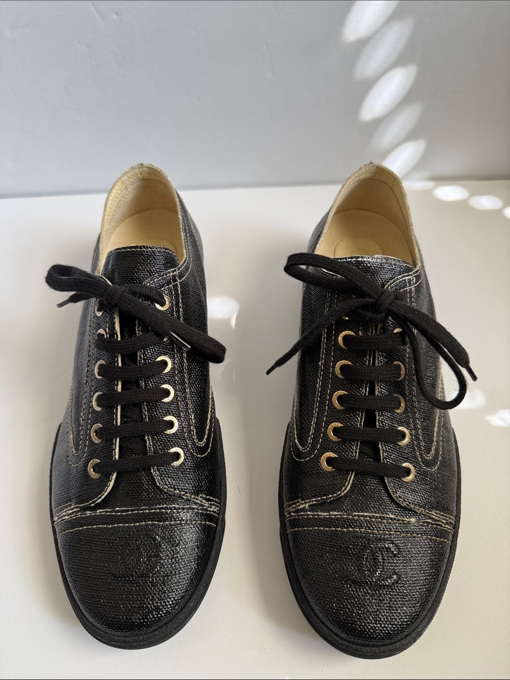 CHANEL Black Coated Canvas Lace-Up Sneakers with Gold Gromets